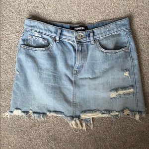 Distressed denim mini skirt
